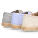 Kids laces up shoes espadrille style in cotton canvas to dress.