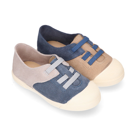 Suede leather Kids Sneaker shoes with toe cap and elastic laces.