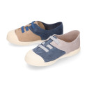 Suede leather Kids Sneaker shoes with toe cap and elastic laces.