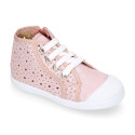 Girl canvas sneaker shoes bootie style with hearts design and toe cap.