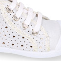 Girl canvas sneaker shoes bootie style with hearts design and toe cap.