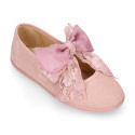 Linen Girl Mary Jane shoes with hook and loop strap closure with bow with lace design.