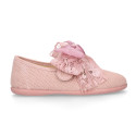 Linen Girl Mary Jane shoes with hook and loop strap closure with bow with lace design.