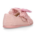 Linen Girl Mary Jane shoes with hook and loop strap closure with bow with lace design.