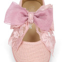 Linen Girl Mary Jane shoes with hook and loop strap closure with bow with lace design.