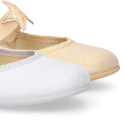 Shiny canvas Ballet flat shoes with elastic band with stars design.