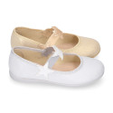 Shiny canvas Ballet flat shoes with elastic band with stars design.