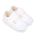 Cotton Canvas kids Sneaker shoes with toe cap and elastic laces.