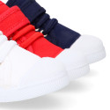 Cotton Canvas kids Sneaker shoes with toe cap and elastic laces.