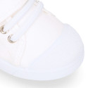 Cotton Canvas kids Sneaker shoes with toe cap and elastic laces.