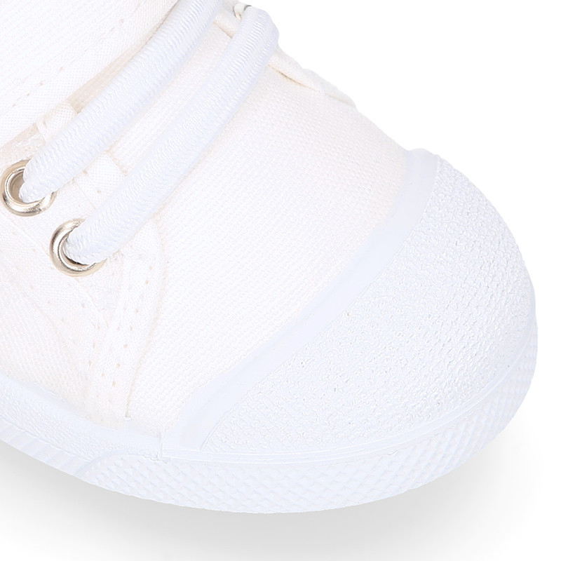Zapatillas multimaterial con cordones elásticos blancas bebé niño