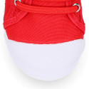 Cotton Canvas kids Sneaker shoes with toe cap and elastic laces.