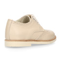 Blucher niño ceremonia con cordones en piel napa beige.