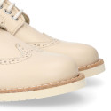 Blucher niño ceremonia con cordones en piel napa beige.