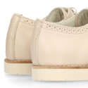 Blucher niño ceremonia con cordones en piel napa beige.