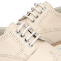 Blucher niño ceremonia con cordones en piel napa beige.