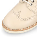 Blucher niño ceremonia con cordones en piel napa beige.