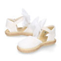 White linen canvas little girl espadrille shoes with Plumeti ribbon design.