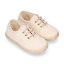 Cotton canvas to dress kids oxford shoes espadrille style with laces closure.