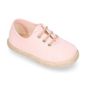 Cotton canvas to dress kids oxford shoes espadrille style with laces closure.