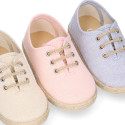 Cotton canvas to dress kids oxford shoes espadrille style with laces closure.