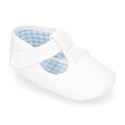 Cotton canvas T-strap shoes with hook and loop strap for babies.