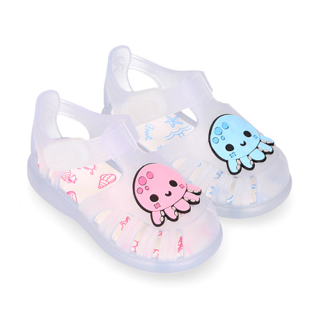 Classic style Kids jelly shoes with hook and loop strap closure and OCTOPUS design.