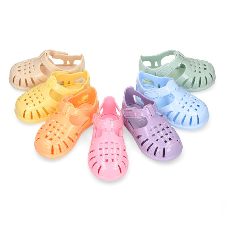 Classic Kids jelly shoes for Beach and Pool use in gloss colors with hook and loop strap closure.