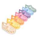 Classic Kids jelly shoes for Beach and Pool use in gloss colors with hook and loop strap closure.