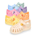 Classic Kids jelly shoes for Beach and Pool use in gloss colors with hook and loop strap closure.