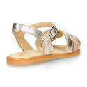 Leather Girl Sandal shoes with h shape design in gold color.