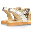 Leather Girl Sandal shoes with h shape design in gold color.