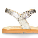 Leather Girl Sandal shoes with h shape design in gold color.