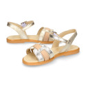 Leather Girl Sandal shoes with h shape design in gold color.