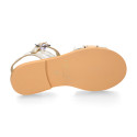 Leather Girl Sandal shoes with h shape design in gold color.