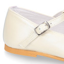 Little T-Strap Okaa Mary Jane shoes in extra soft pearl ivory Nappa leather with perforated design.