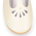 Little T-Strap Okaa Mary Jane shoes in extra soft pearl ivory Nappa leather with perforated design.