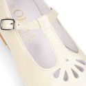 Little T-Strap Okaa Mary Jane shoes in extra soft pearl ivory Nappa leather with perforated design.