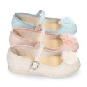 Linen canvas Stylized girl Mary Jane shoes with flower design and buckle fastening.