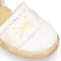 White cotton canvas little girl espadrille shoes with lace design.