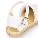 White cotton canvas little girl espadrille shoes with lace design.