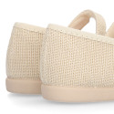 Ivory linen canvas Girl Mary Jane shoes with hook and loop strap closure and button.