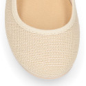 Ivory linen canvas Girl Mary Jane shoes with hook and loop strap closure and button.