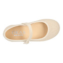 Ivory linen canvas Girl Mary Jane shoes with hook and loop strap closure and button.