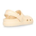 Kids jelly shoes with clog strap design in ivory color for beach and pool use.