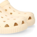 Kids jelly shoes with clog strap design in ivory color for beach and pool use.