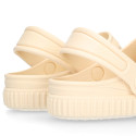 Kids jelly shoes with clog strap design in ivory color for beach and pool use.