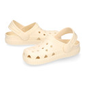 Kids jelly shoes with clog strap design in ivory color for beach and pool use.