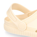 Kids jelly shoes with clog strap design in ivory color for beach and pool use.