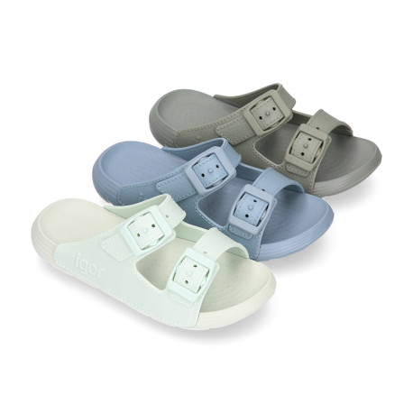 Kids Clog jelly shoes style in solid colors with buckles design.